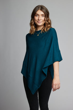 Ultra soft and lightweight one size asymmetrical poncho sweater wrap.